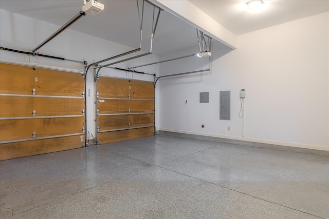 garage featuring a garage door opener and electric panel