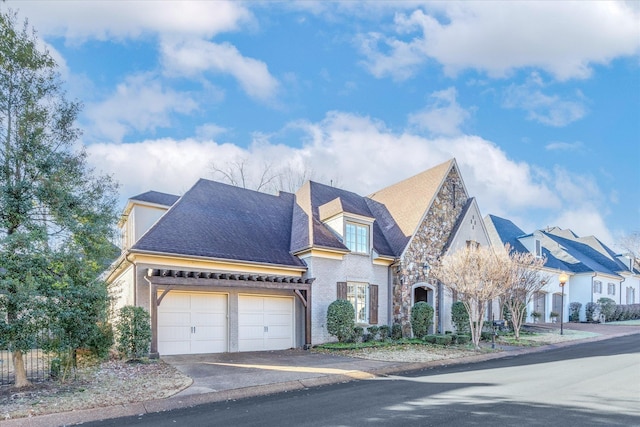 view of front of property with a garage