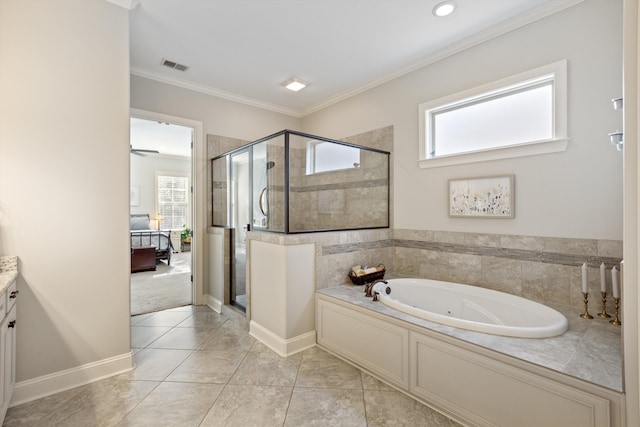 bathroom featuring independent shower and bath, crown molding, tile patterned floors, and vanity