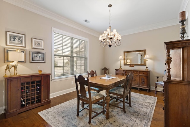 dining area with crown molding, dark wood-type flooring, and a notable chandelier