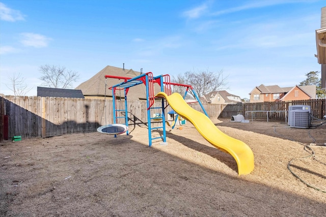 view of play area with a trampoline and central AC