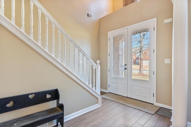 entryway featuring french doors