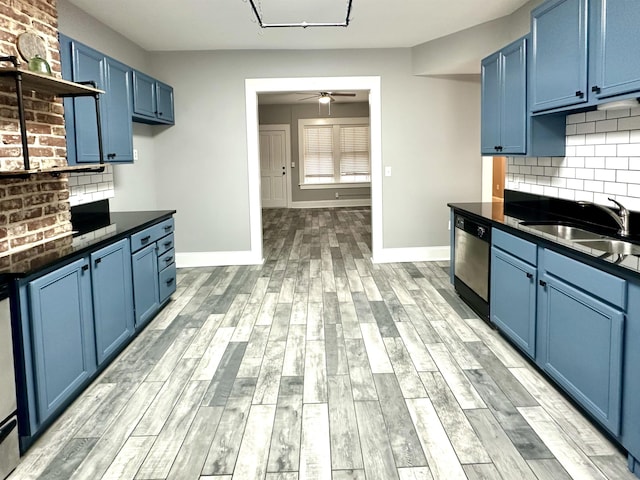 kitchen with sink, light hardwood / wood-style flooring, dishwasher, tasteful backsplash, and blue cabinets