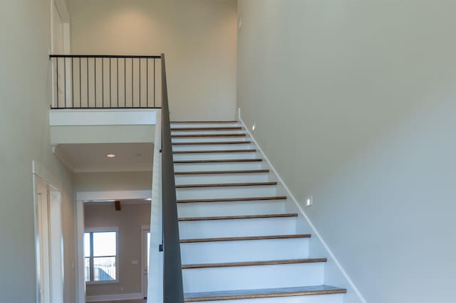 stairs with crown molding