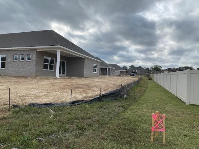 view of home's exterior featuring a lawn