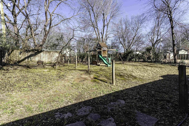 view of yard with a playground