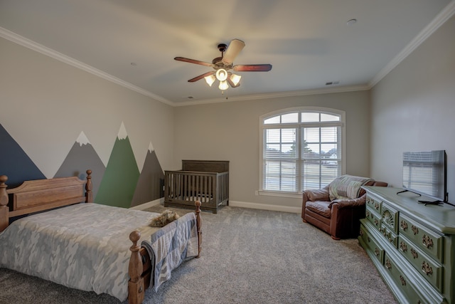 bedroom featuring ornamental molding, light colored carpet, and ceiling fan