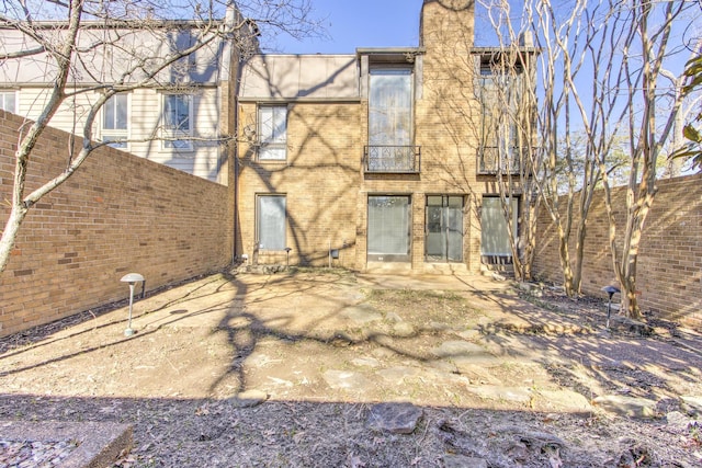 back of house featuring a patio area