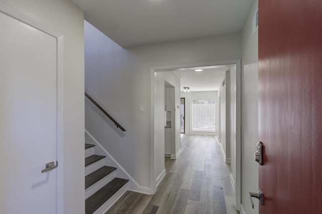 corridor featuring hardwood / wood-style flooring