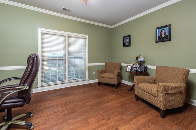 office with crown molding and dark hardwood / wood-style flooring