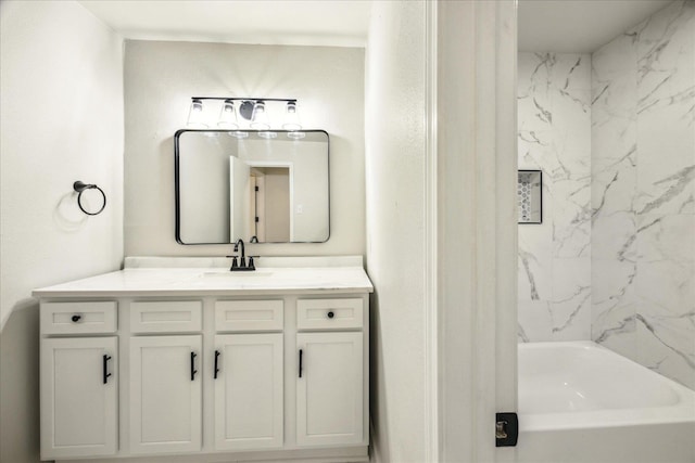 bathroom with vanity and tiled shower / bath combo