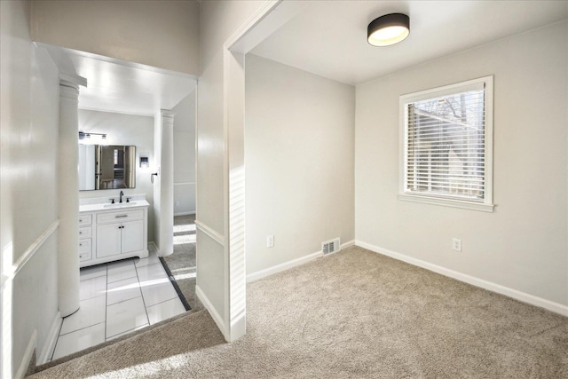 bathroom with vanity and tile patterned floors