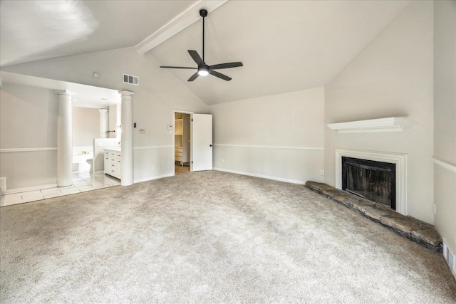 unfurnished living room with light colored carpet, high vaulted ceiling, ceiling fan, beam ceiling, and decorative columns