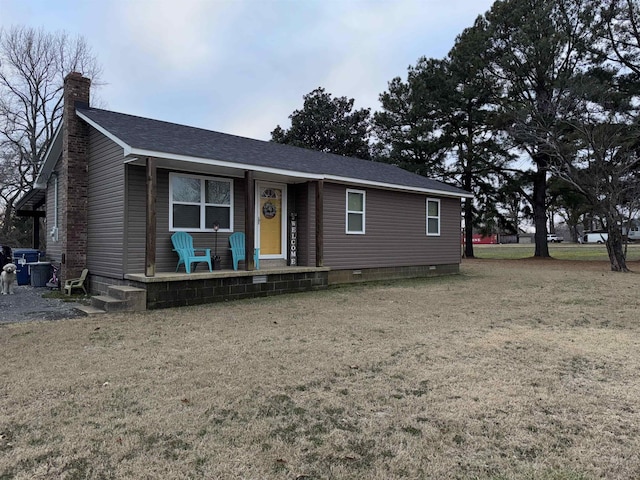 view of front facade featuring a front yard