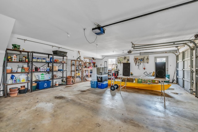 garage featuring a garage door opener