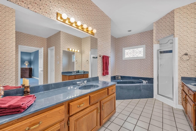 bathroom with vanity, separate shower and tub, and tile patterned floors