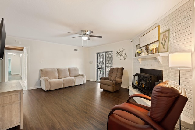 living room featuring dark hardwood / wood-style floors and ceiling fan