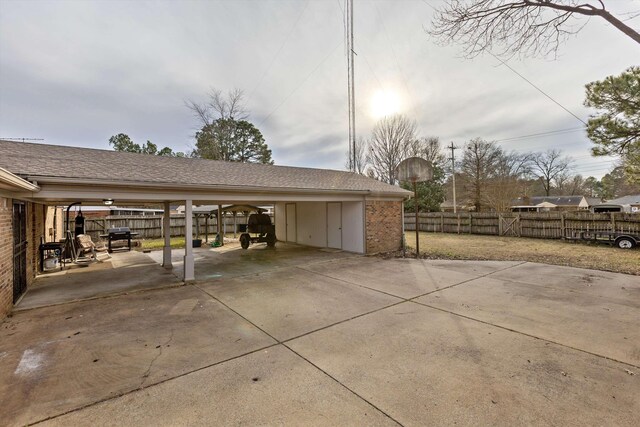 exterior space featuring a carport