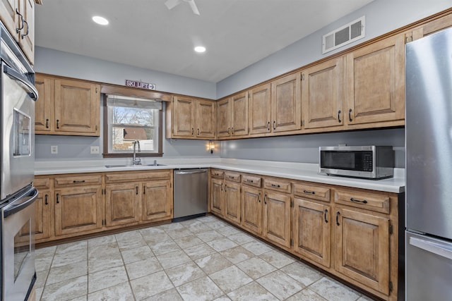 kitchen featuring sink and appliances with stainless steel finishes