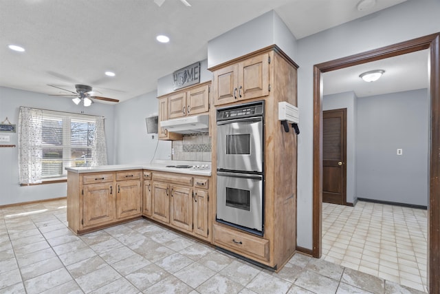 kitchen featuring light tile patterned floors, ceiling fan, white electric stovetop, tasteful backsplash, and stainless steel double oven