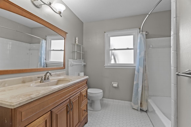 full bathroom featuring vanity, shower / bath combo, tile patterned floors, and toilet