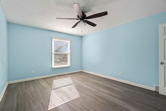 unfurnished room featuring ceiling fan, hardwood / wood-style floors, and a textured ceiling