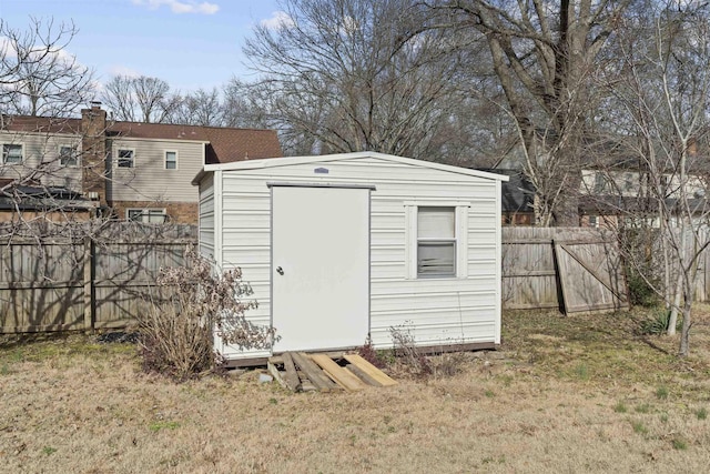 view of outdoor structure with a lawn