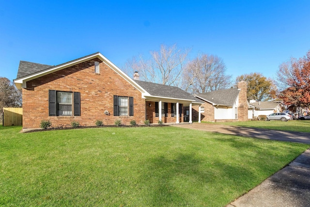 ranch-style house with a front lawn