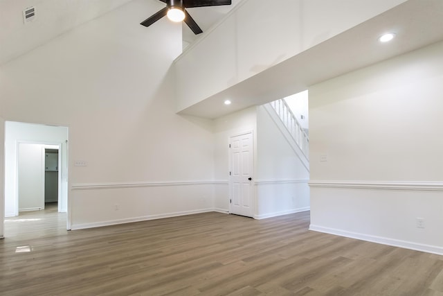 bonus room featuring ceiling fan, wood-type flooring, and high vaulted ceiling