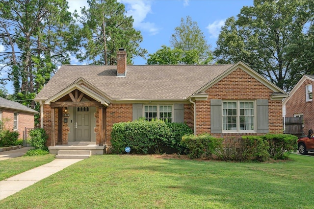 view of front of home with a front yard