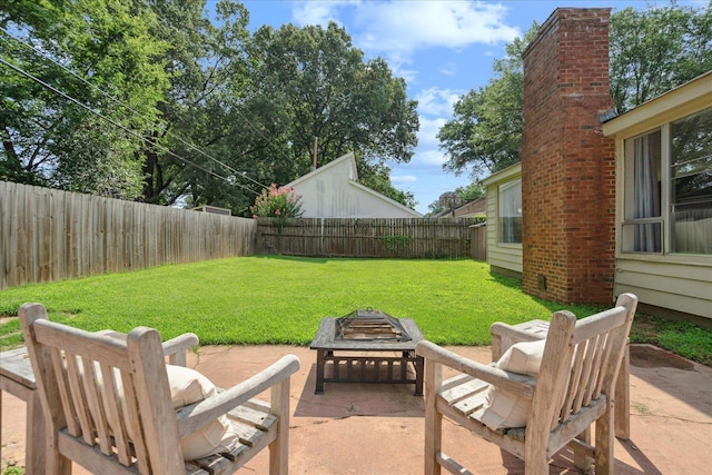 view of patio / terrace with a fire pit