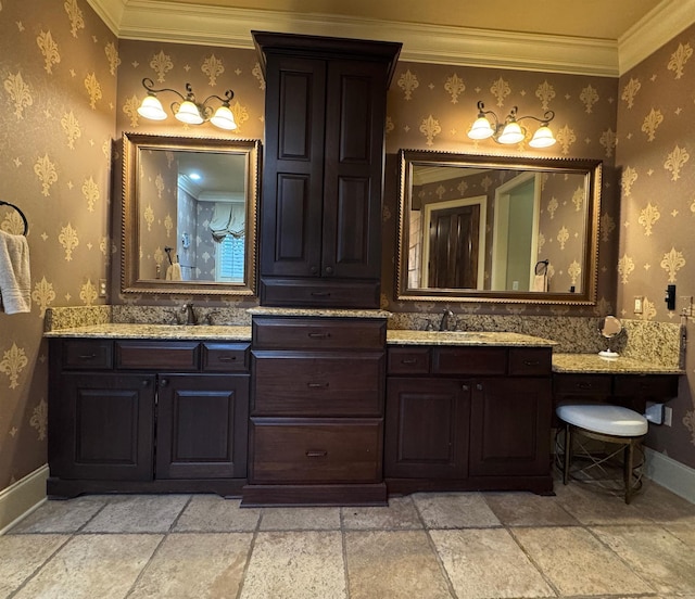 bathroom with vanity and ornamental molding