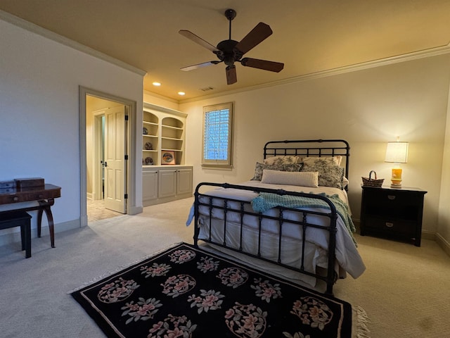 bedroom featuring crown molding, light carpet, and ceiling fan