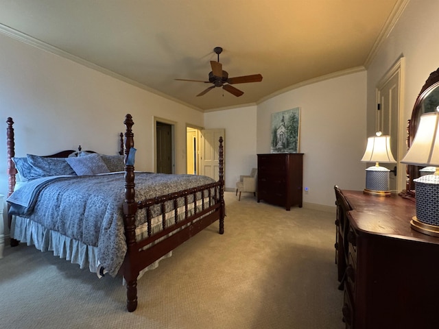 bedroom with ceiling fan, ornamental molding, and carpet