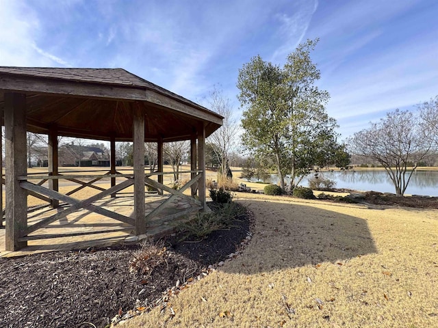 view of yard with a water view and a gazebo