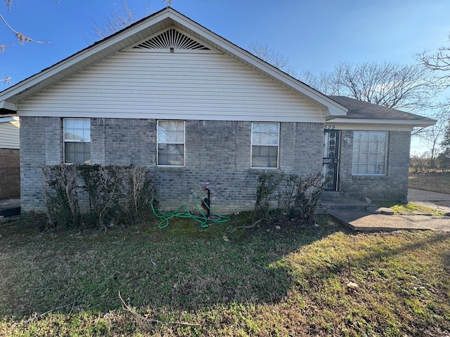 exterior space with a front yard