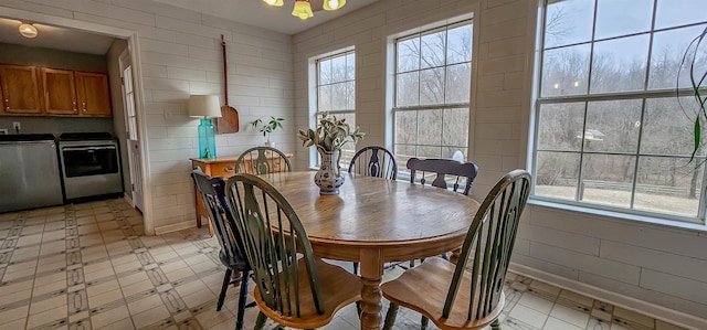 dining space with washing machine and dryer