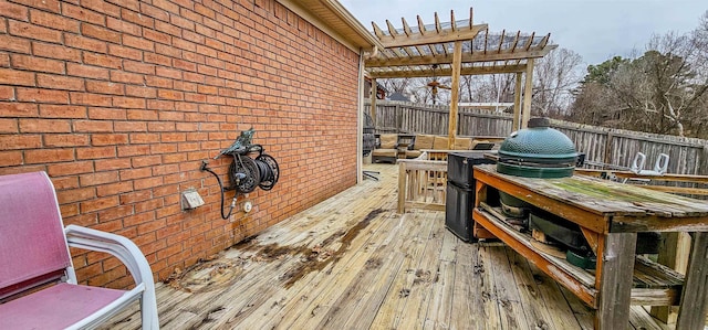wooden terrace with a pergola
