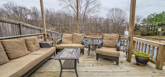 wooden deck featuring an outdoor hangout area
