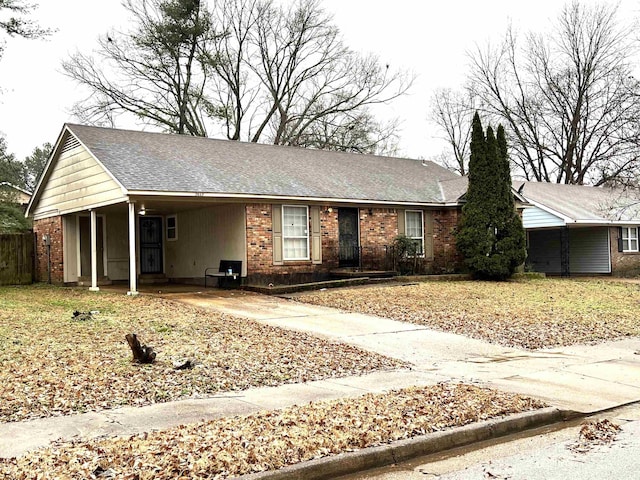 single story home with a carport