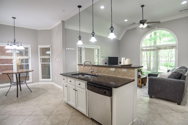 kitchen featuring sink, white cabinets, a center island with sink, decorative light fixtures, and stainless steel dishwasher