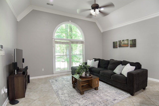 tiled living room with lofted ceiling, crown molding, and plenty of natural light