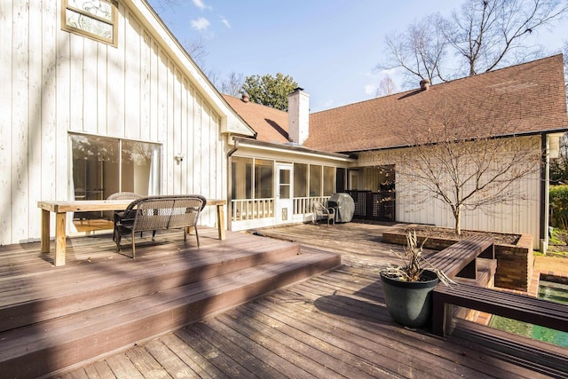 deck featuring a sunroom