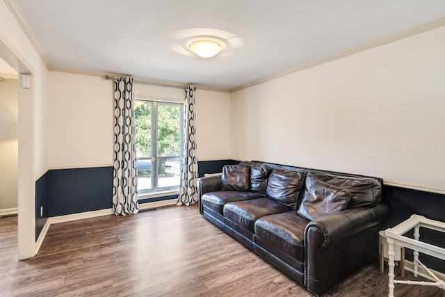 living room featuring crown molding and hardwood / wood-style floors