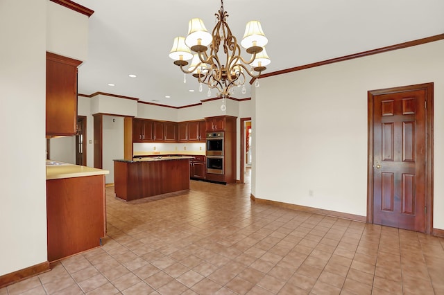 kitchen featuring an inviting chandelier, decorative light fixtures, crown molding, and stainless steel double oven