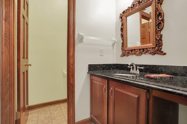 bathroom with vanity and tile patterned floors