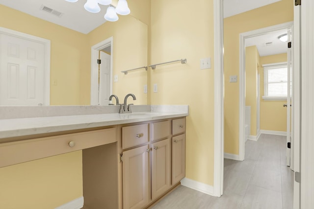 bathroom featuring vanity and tile patterned flooring