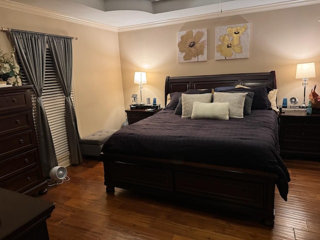 bedroom featuring dark hardwood / wood-style flooring and crown molding