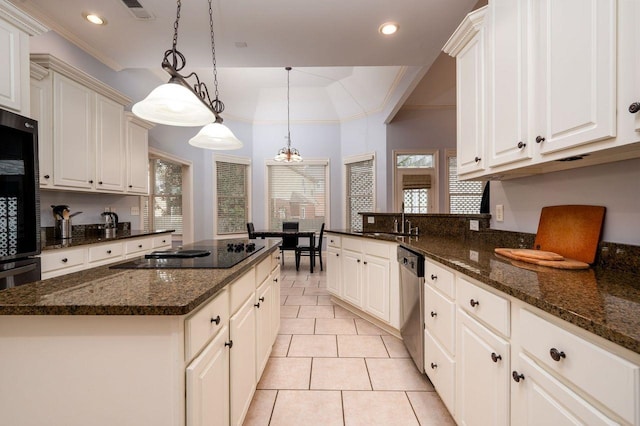 kitchen with a kitchen island, dark stone countertops, white cabinets, stainless steel dishwasher, and black electric cooktop