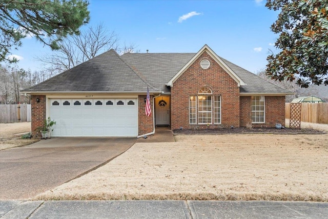 ranch-style home featuring a garage